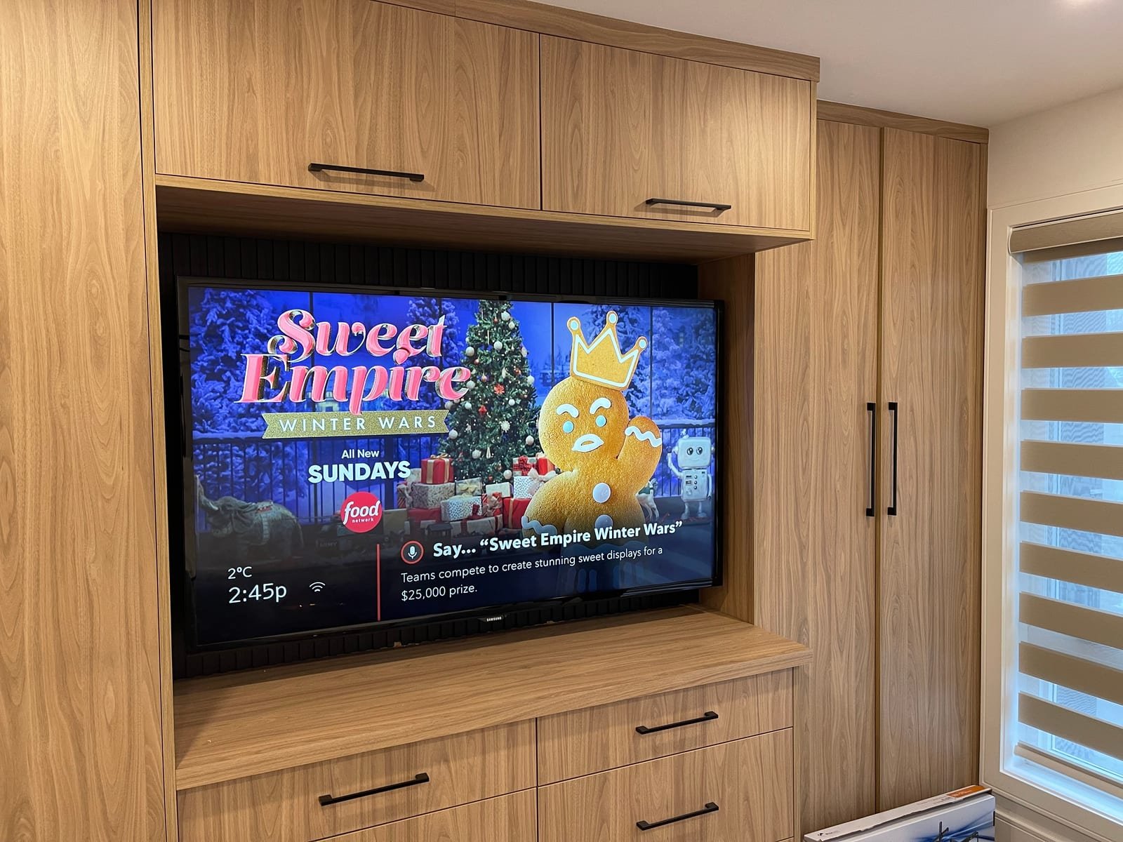 Television installed in a custom built-in cabinet